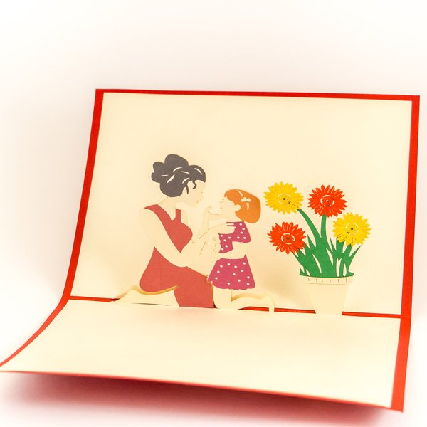 Mutter mit Kind und Blumen